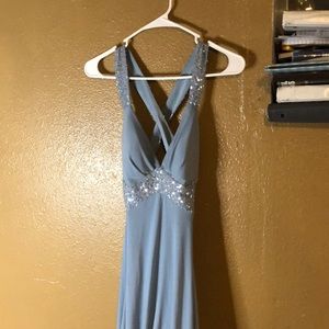 Blue dress worn once at prom. No tags. Backless. Silver sequins.